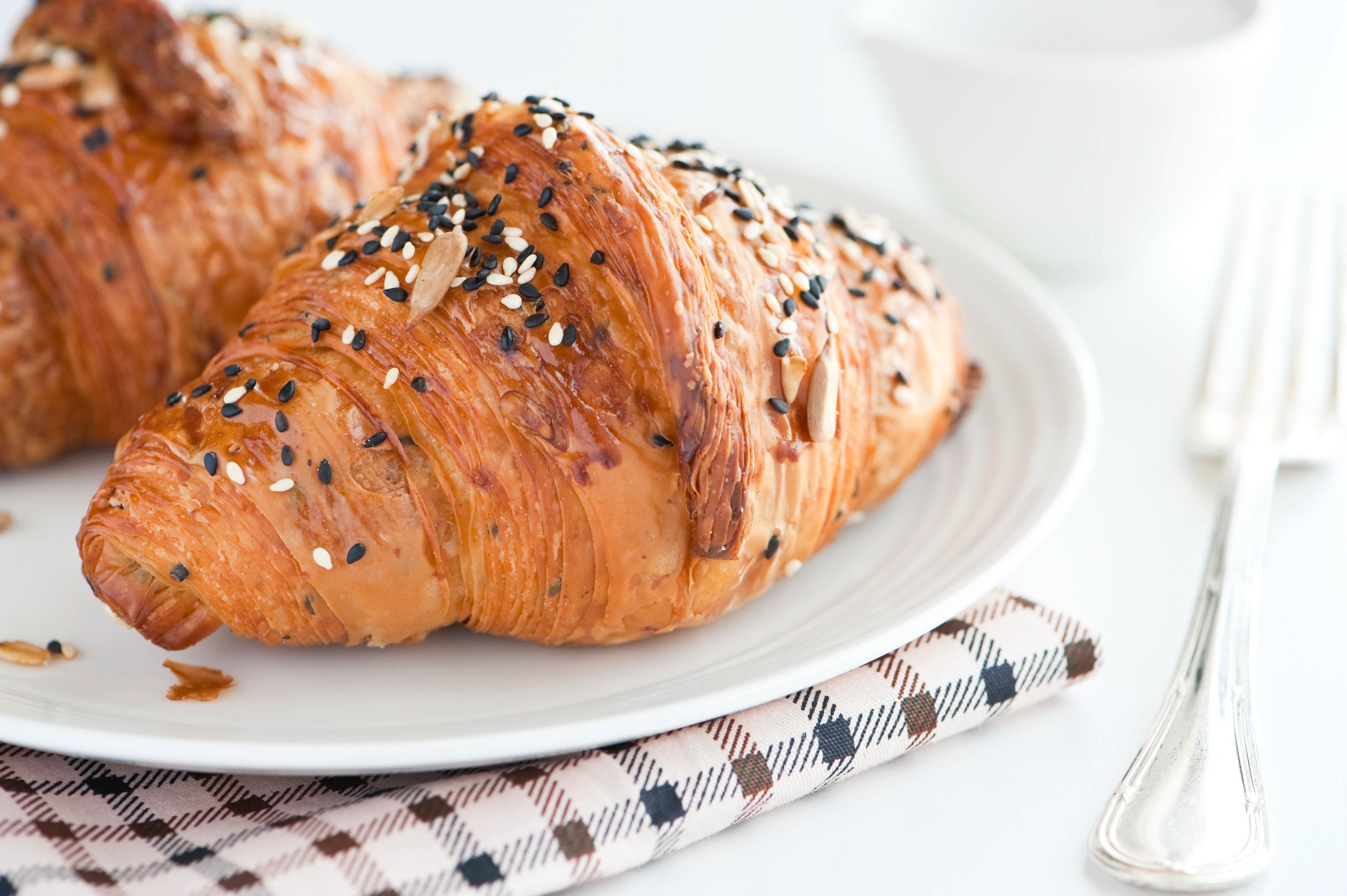 Fresh croissants with sesame seeds