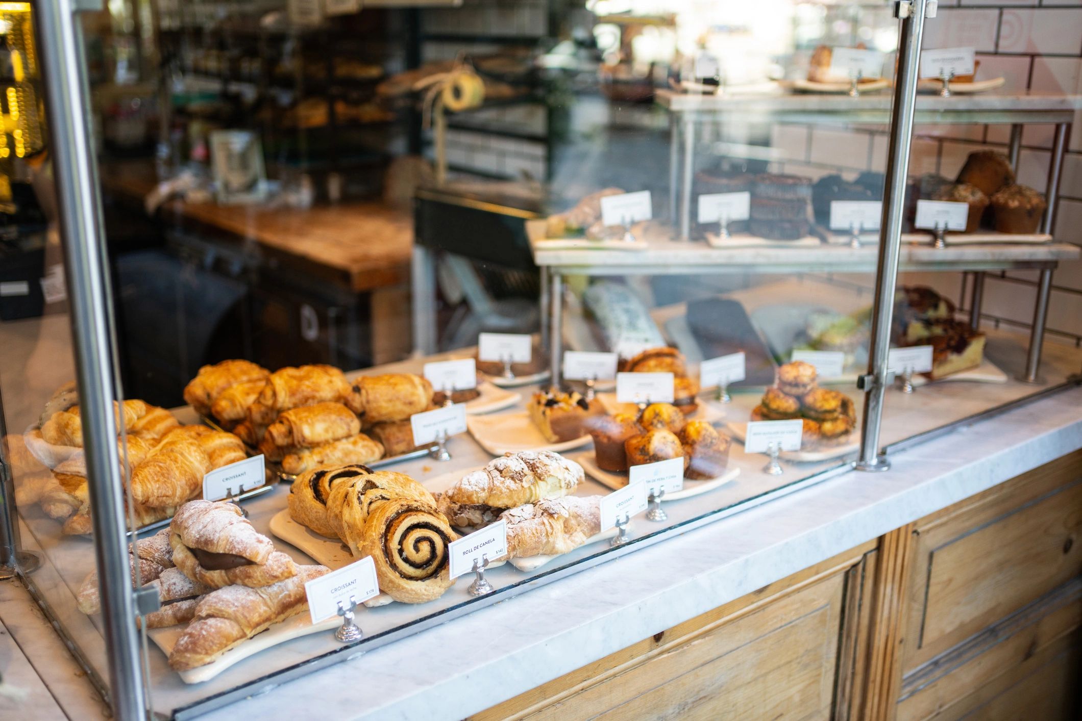 Assorted baked goods in a bakery display case