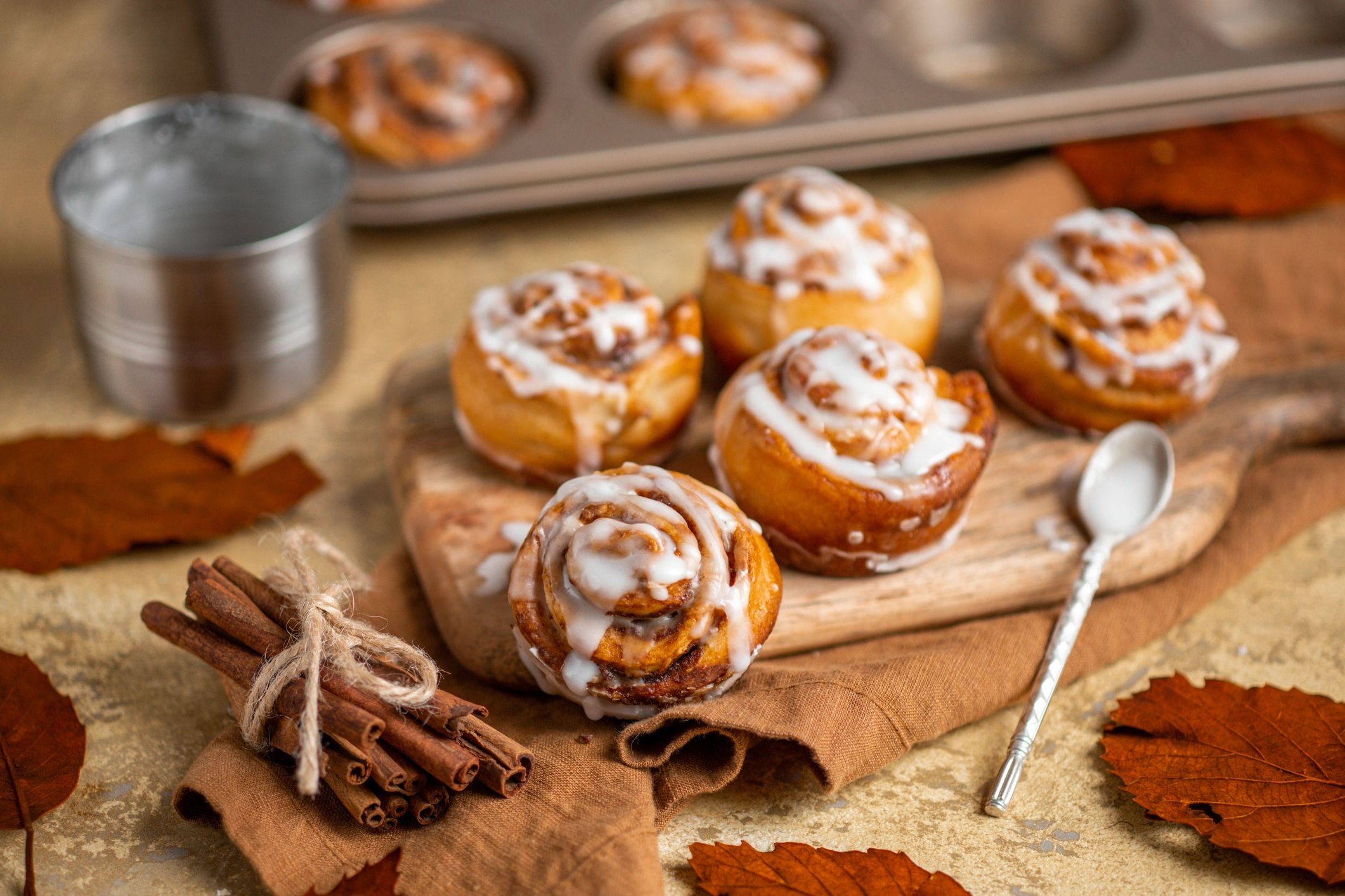 Homemade cinnamon rolls dusted with icing sugar
