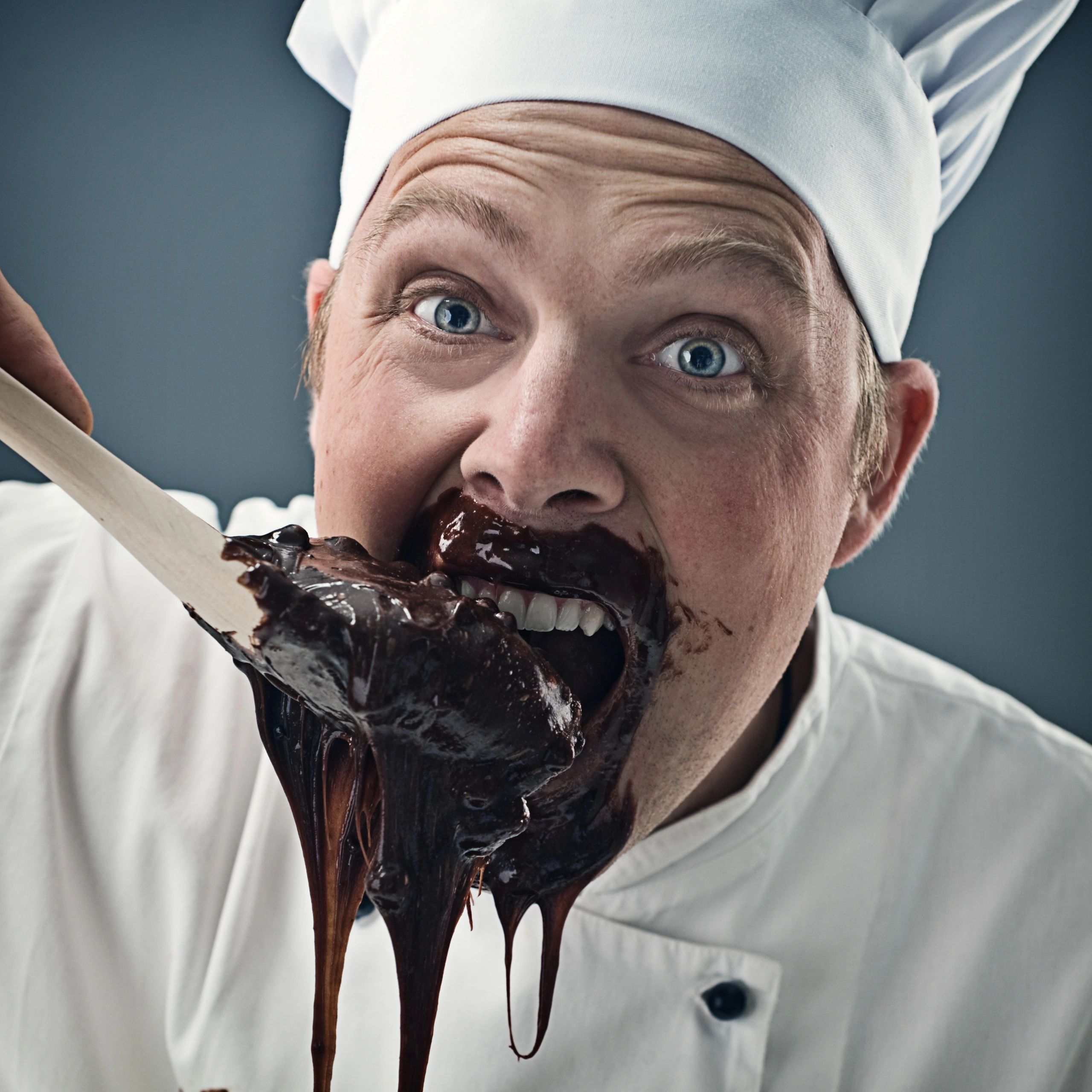 Portrait of a baker in a kitchen setting